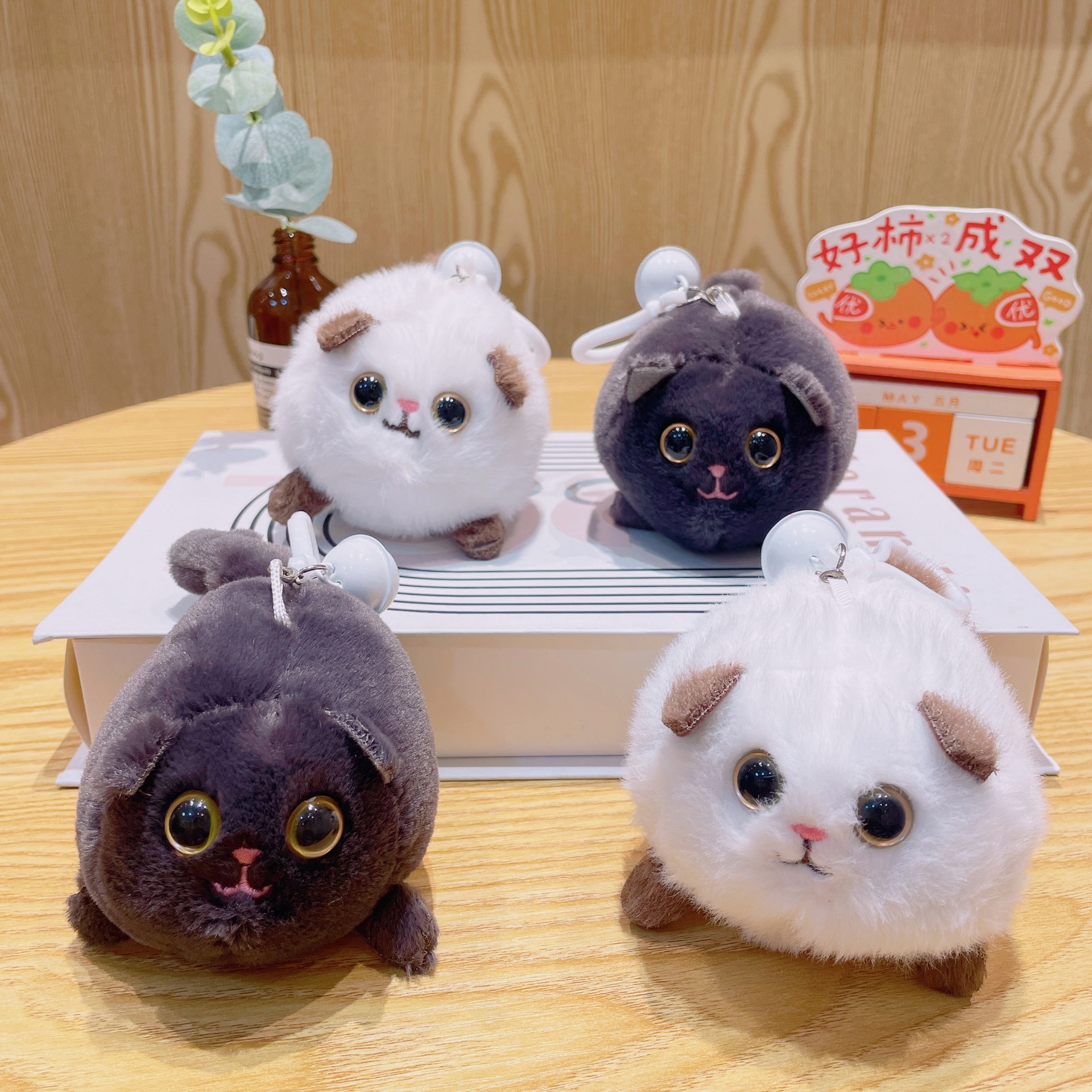 Wiggly Tail Black and White Cat Keychain